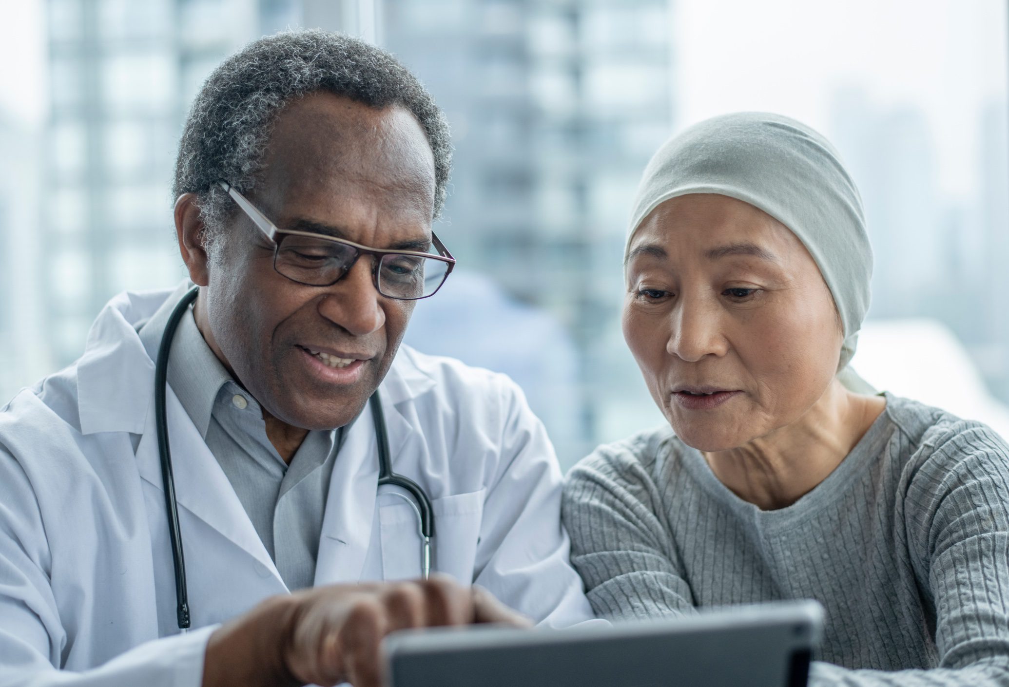 Doctor and Patient looking at ipad