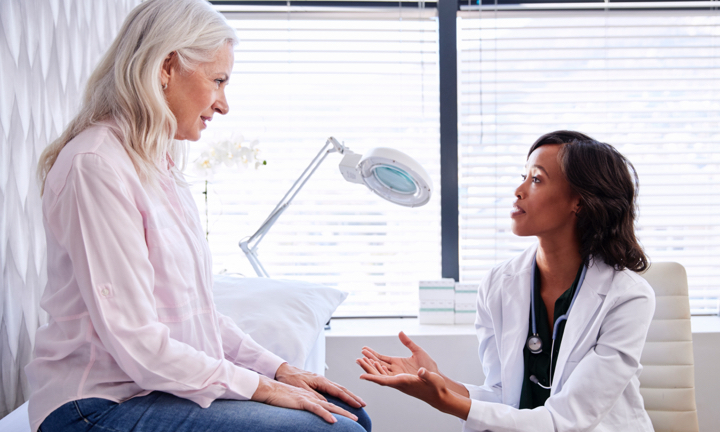 A doctor and patient talking